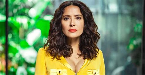 Salma Hayek puts on busty display in sexy yellow bikini